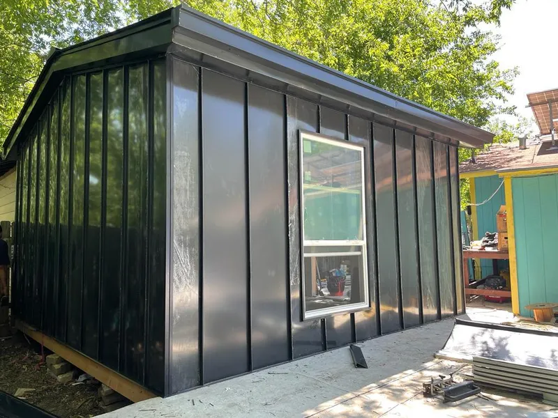 Black standing seam metal wall panels for Metal Roof Installation in Springtown