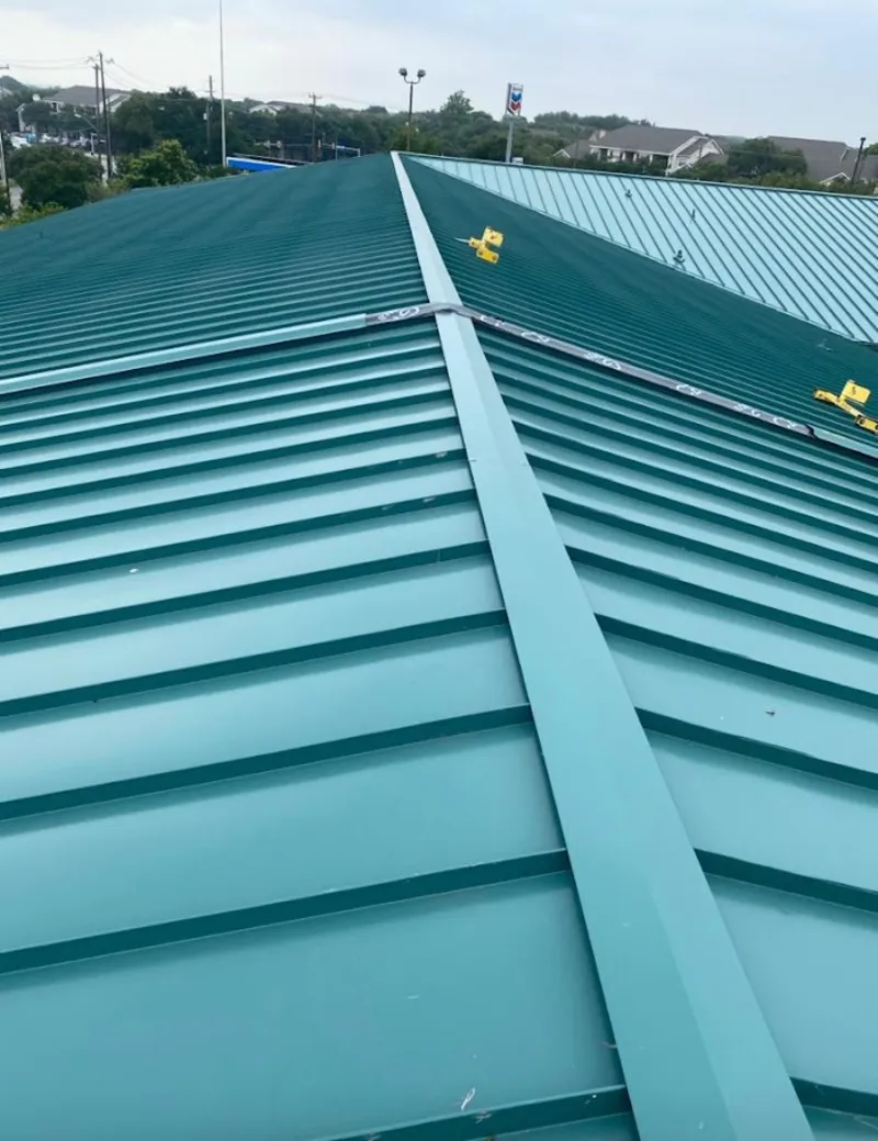 Green commercial metal roof ridge and valley for Metal Roof Repair in Springtown